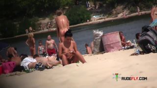 Curvy youthful naturist lets the sun kiss her body  5-0