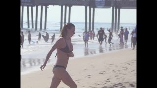 Busty ginger girl enjoys big waves in the water Nudism-8