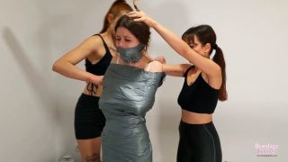 Lezdom Bondage Kitties - Substitute players mummify and humiliate team captain Lezdom  -2