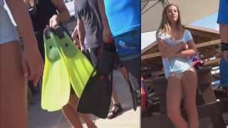 Cute teen goes snorkeling with parents-9