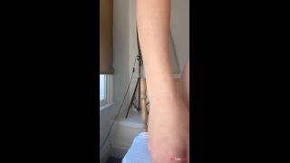 Hot redhead MILF smokes while stuffing her pink pussy with a dildo-1