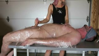 Tied up guy gets his genitals hit many times.-9