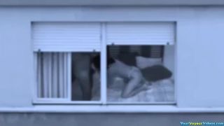 Mature couple fucking by the window-2