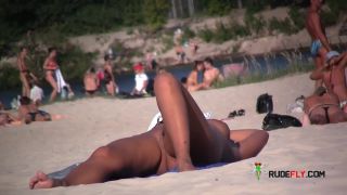 Damsel relaxing on nude plage  3-1