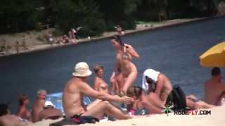 Busty sexy chicks group on naturist strand  3-4