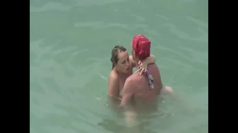 Two couple fucking in the water