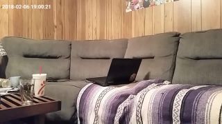 Horny busty girl watching laptop porn and fingering pussy on the couch-9