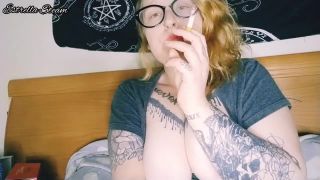 Estrella Steam smokes a cigar while playing with her tit - Smoking-5