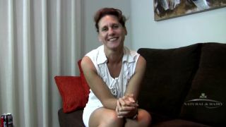 Inge talks on the couch and reveals hairy pussy milf Inge-0