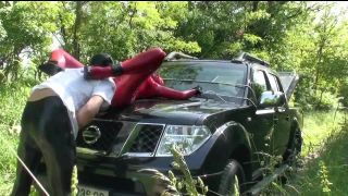 Girl Full Encased in Red Latex with Rubber Mask and Gloves Fucked on Car Latex!-5