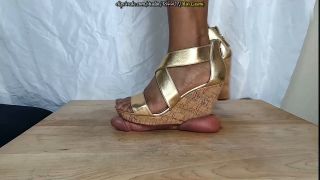 MERCILESSLY BEATEN BENEATH MY WEDGES [CLOSE-UP].-4