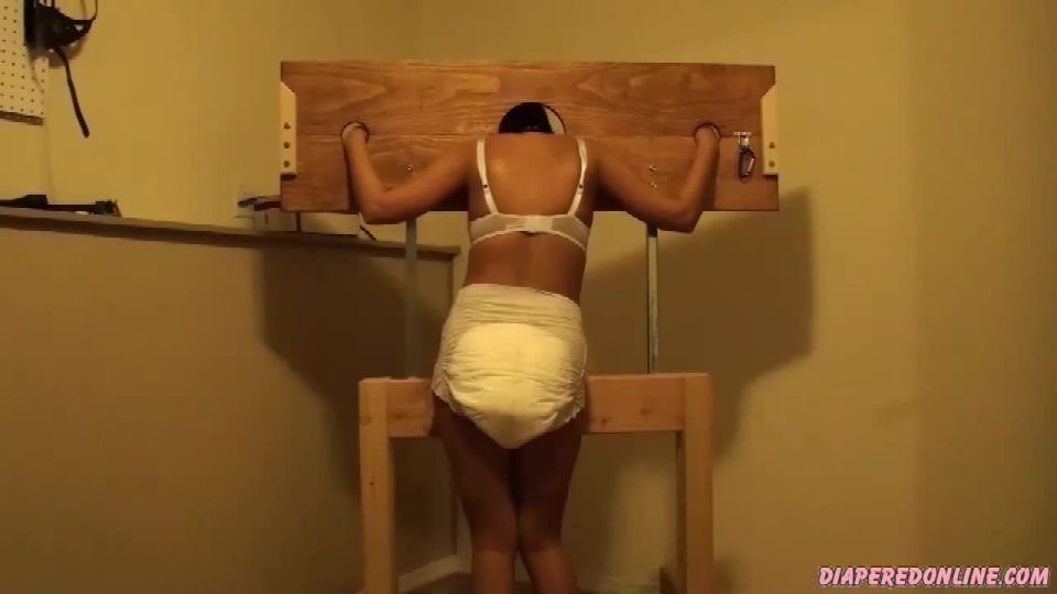 Diaperedonline2Nikki Nikki Belt Spanking in Pillory