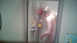 cute busty blonde girl taking a shower and shaving legs. hidden cam-0