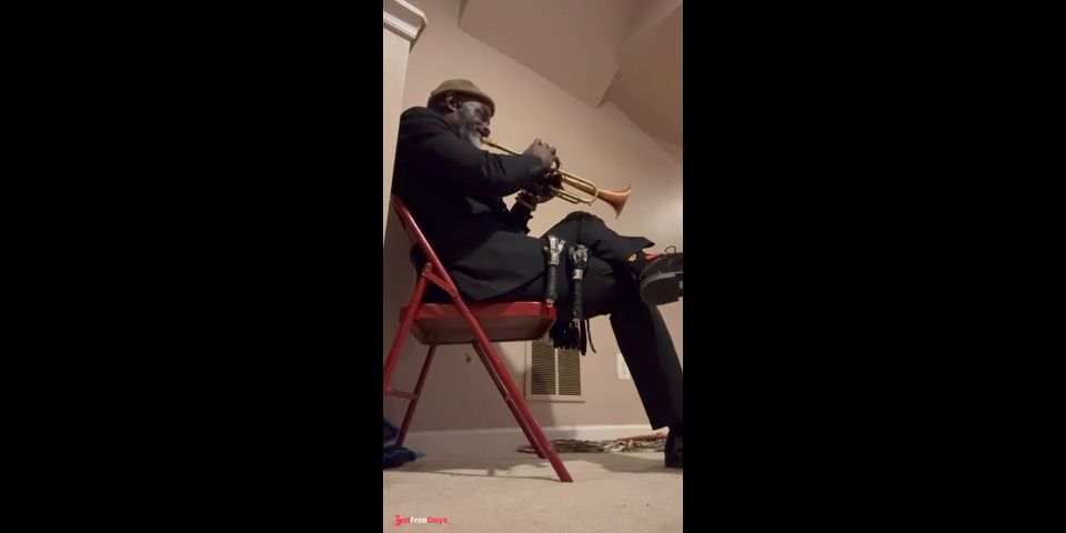 Naked Trumpeter playing Nothing on by Tank
