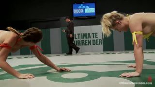 Blond Fitness model & gorgeous brunette battle it out on the mat. Loser gets fucked, must lick pussy Muscle!-0