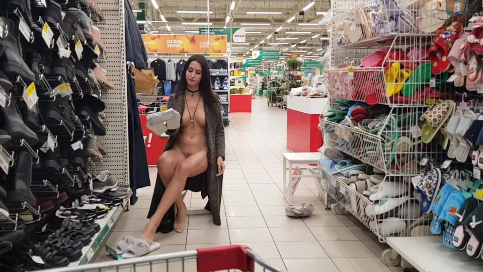 Sweetbuttocks - naked girl in the store shows her legs and other parts of her body