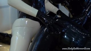 Strap on fuck in full rubber latex -0