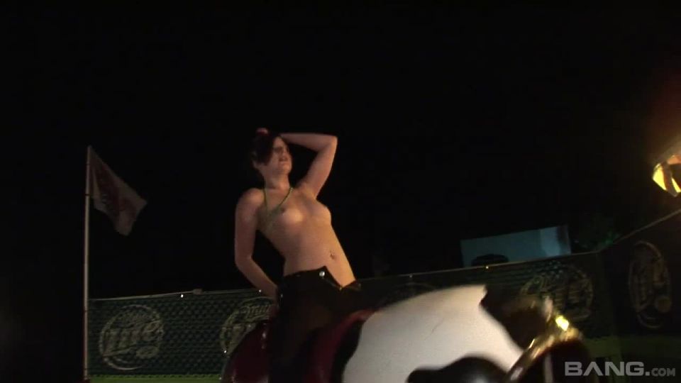 Three Topless Brunettes Ride A Mechanical Bull