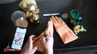 DOminatrix Mara Draws Flowers on Her Leather Gloves-3