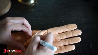 DOminatrix Mara Draws Flowers on Her Leather Gloves-6