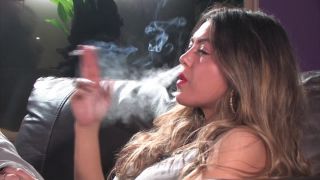 Ava Relaxes On The Arm Chair Smoking Marlboro Lights.-6
