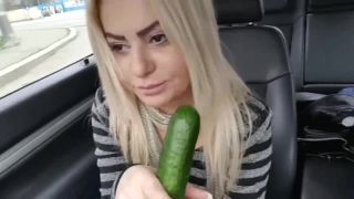 Slutty mom fucks herself with big cucumber until squirt in the car-0