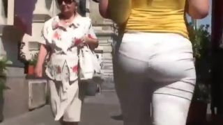 Following a big butt in white  pants-3