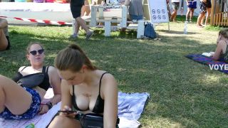 Shameless sunbathing in her black bra Voyeur!-0