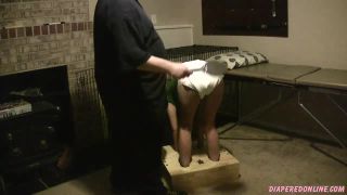 DiaperedonlineDolly Dolly Spanked in Standing Stocks-4