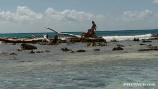 Jamie Brooks Lies in the Sand While Two Men Enter Her-5