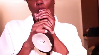 Femme Ebony girl moans while sucking a huge black dildo-9