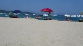 Secret view as she rubs pussy on a beach public -0