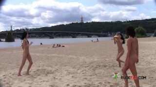 Teasing on a nudist  beach-3