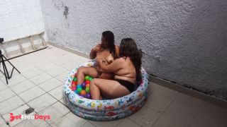 hot girls make video in the backyard showing their big tits.-2