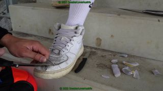 SneakerLoverAustria - cutting black and white nike af1 mid from slaves feet-6