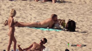 Her sexy body gets a tan after she strips naked-7