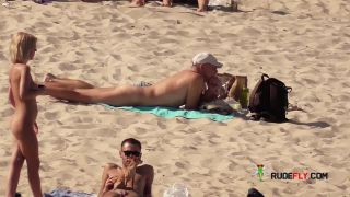 Her sexy body gets a tan after she strips naked-9