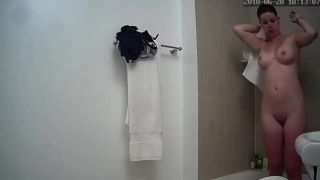 Super busty girl taking a shower. hidden cam-0