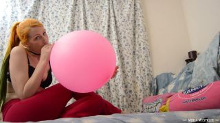 Misha mystique blowing up 16 inch balloon popping it-3