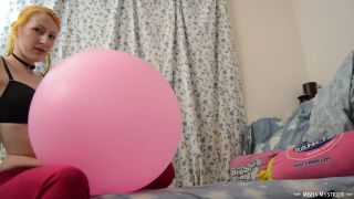 Misha mystique blowing up 16 inch balloon popping it-8