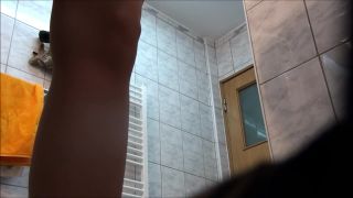 cute brunette girl changing in the shower room. hidden cam-1