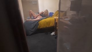 Spying through the window voyeur horny blonde girl masturbating on the bed while watching laptop porn - Amateur-6