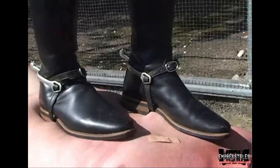 Riding Mistress has fun with Her human carpet.