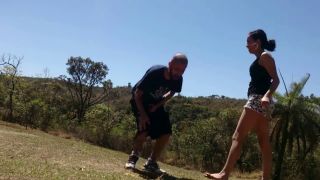 Cute and laughing petite but strong girl takes her guy outdoors in different locations and kicks his balls at each location. (Amateur porn)-7