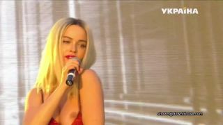 This beautiful russian singer can't keep her nip inside the  dress-7