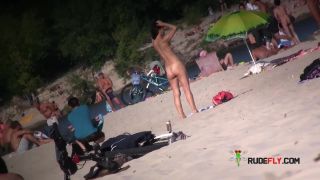 Nudist girls have fun with each other at the beach  4-7