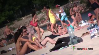 Nudist girls have fun with each other at the beach  4-8