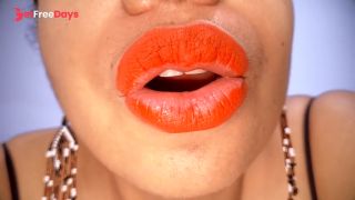 Ebony MILF with red lips eats a fruit suggestively-9