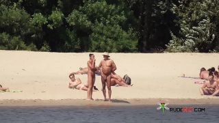 Naked teen naturist lets the water kiss her  body-3