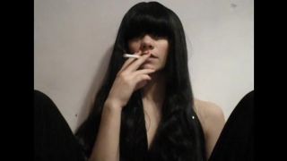 Long Haired Bitch Smoking A Cigarette.-1